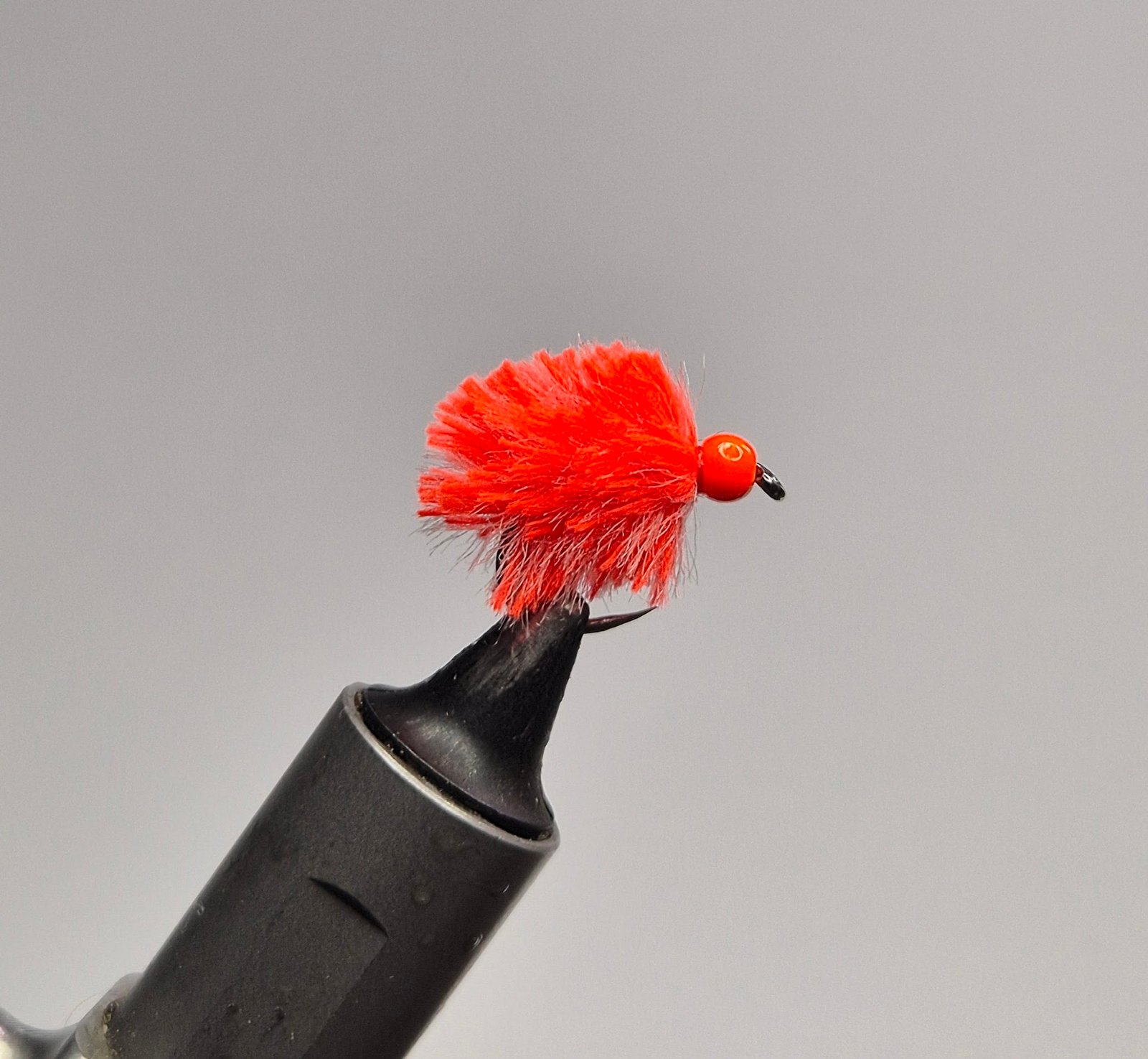 Glow in the dark Fire Orange Egg Fly Barbless.