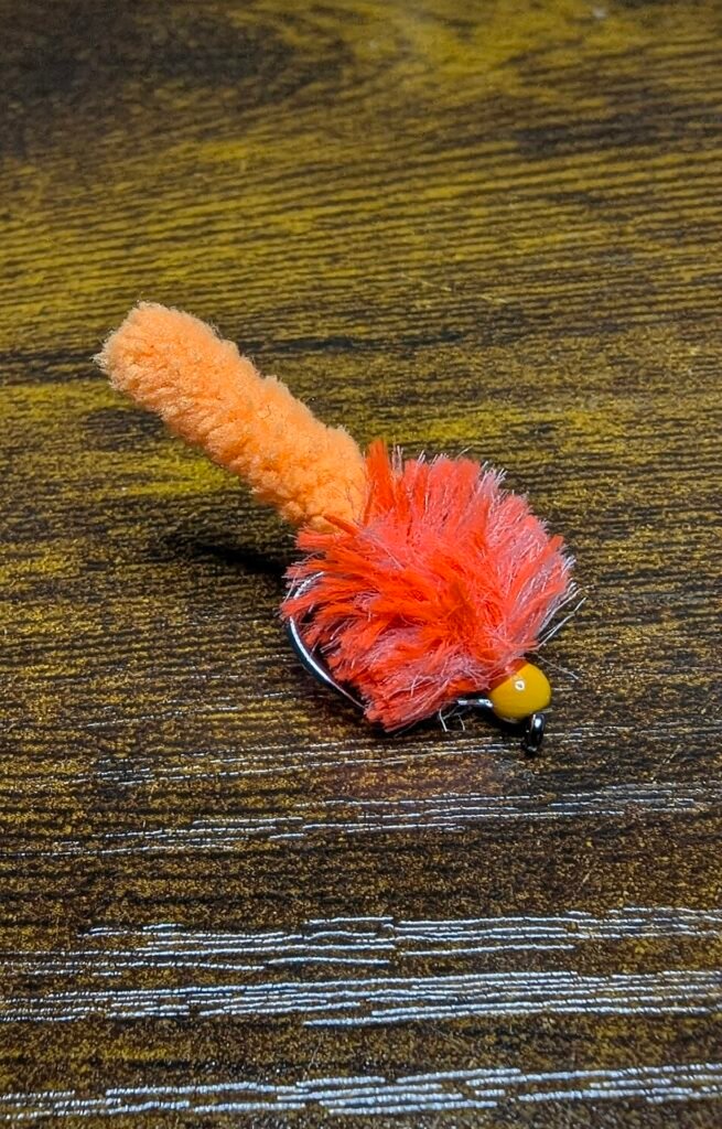 Glow in the dark Fire Orange Mop Fly.