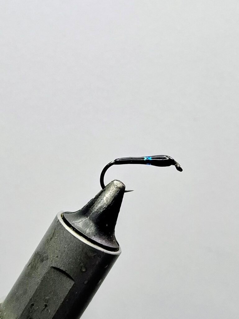 Blue holographic Vicars Buzzer Barbless.