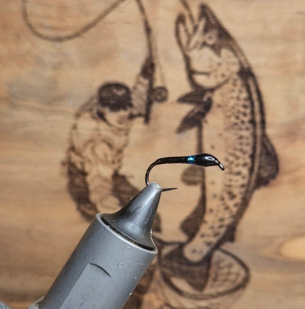 Blue holographic Vicars Buzzer Barbless.