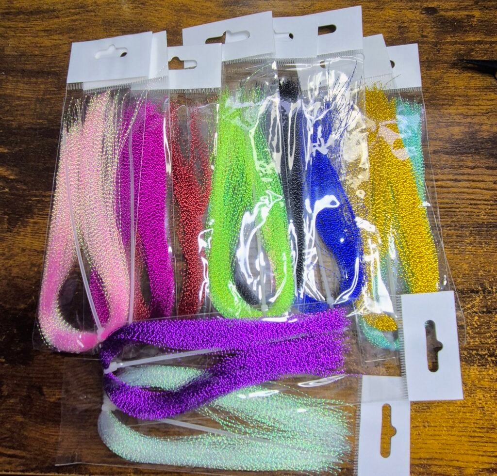 Crystal Flash Fly Tying Material – Fine, reflective strands for adding sparkle and attraction to trout flies, blobs, lures, nymphs and streamer patterns. from Granite City Fishing